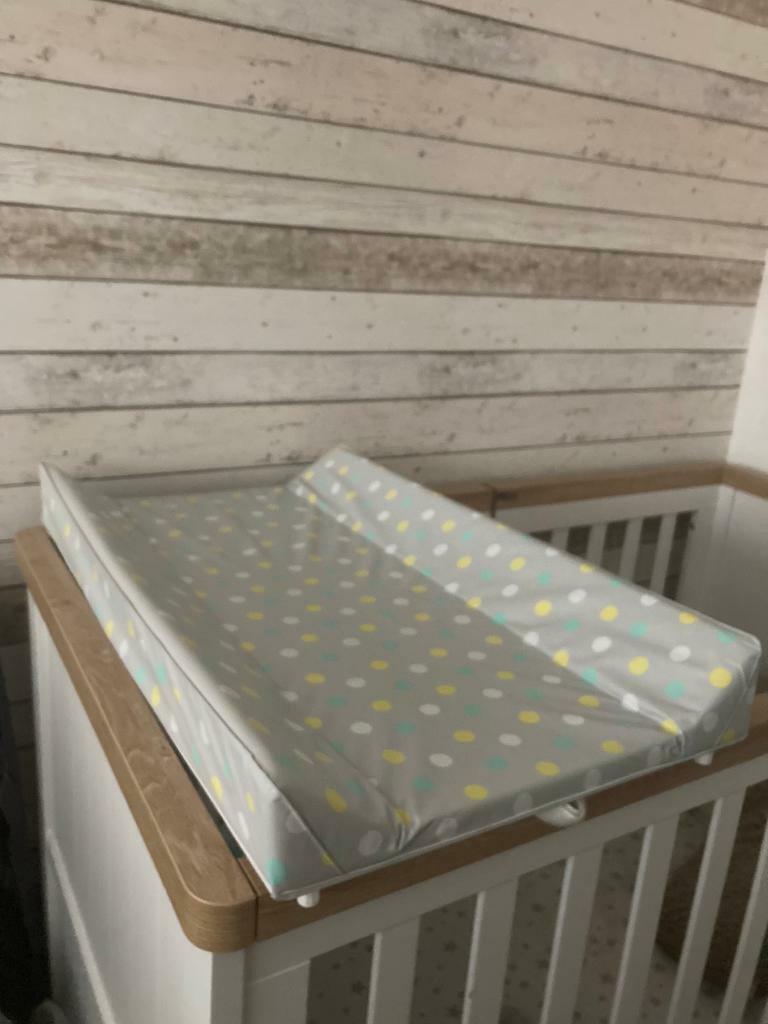 changing mat over cot